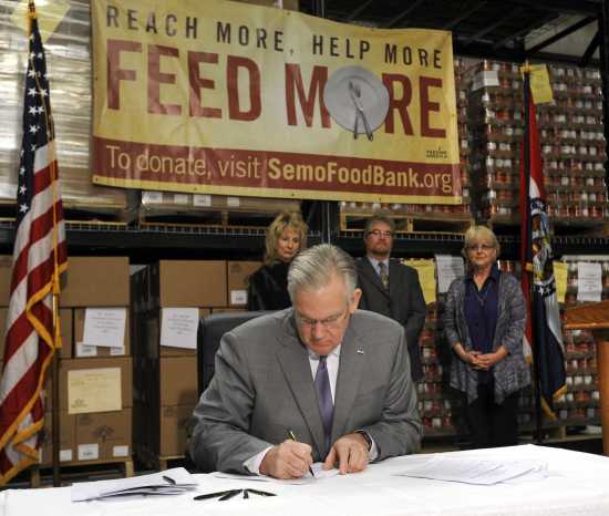 Local News Nixon Signs Tax Credit Bill Food Pantries Celebrate