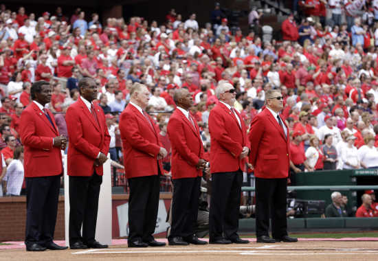 Fans remember Cardinals great in home opener