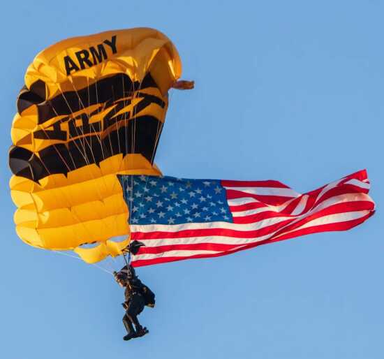 A member of the U.S. Army Golden Knights Parachute team performs a